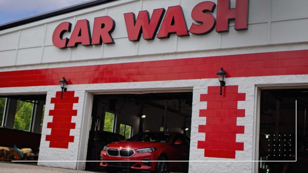An image of a car wash sign and car wash spot/shop